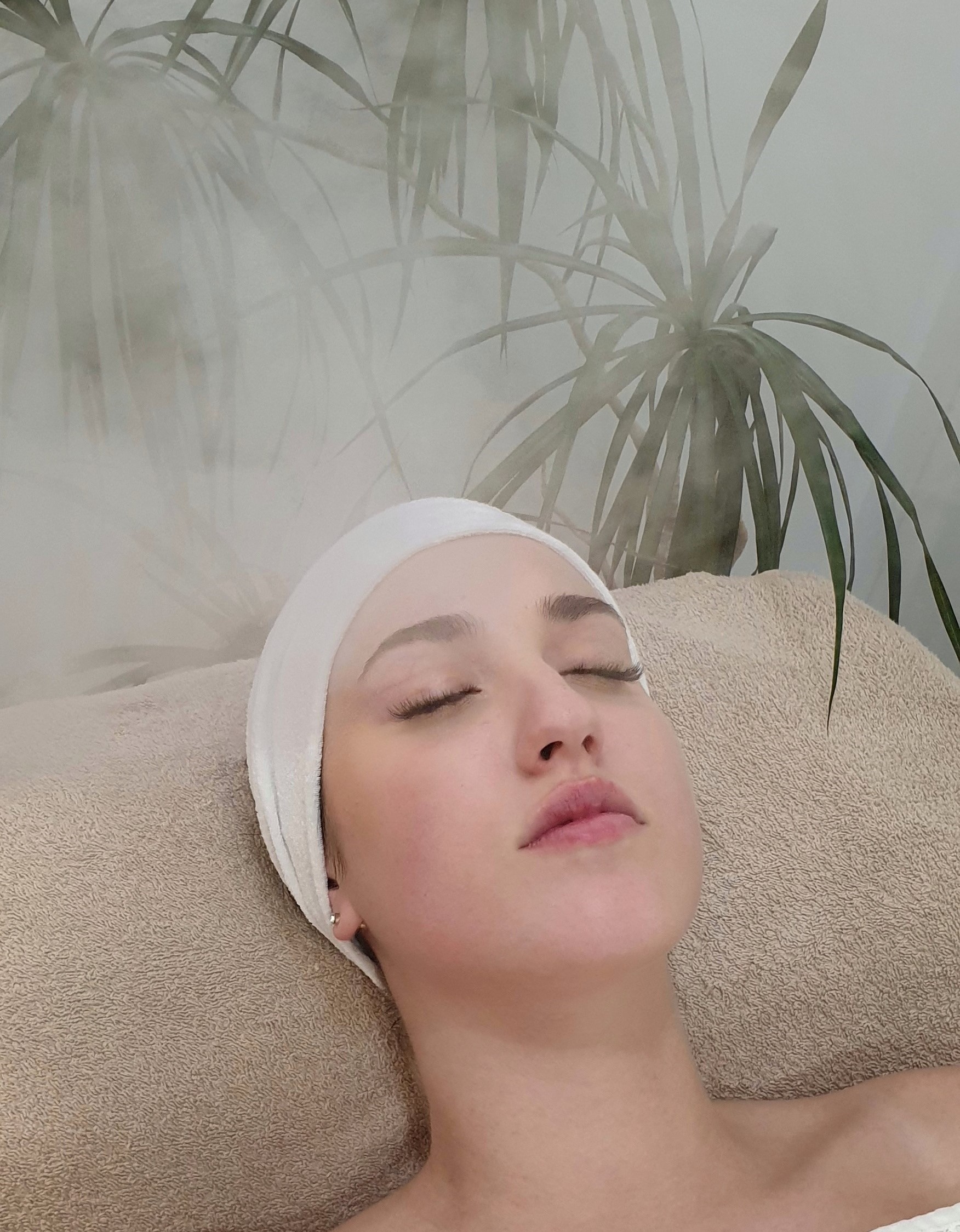 Facial cleaning treatment being done on a woman